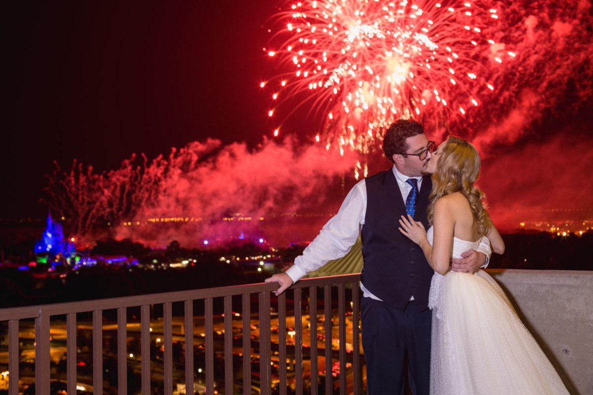 Disney wedding pavilion and California Grill wedding with fireworks by top Orlando wedding photographer
