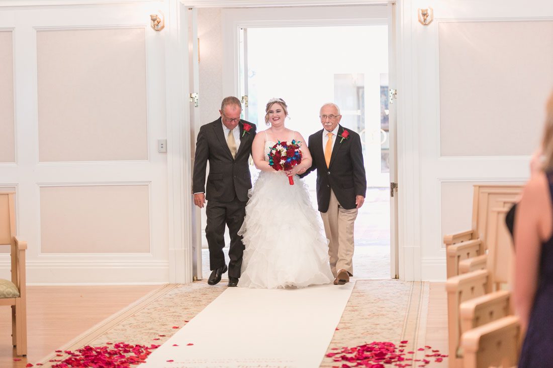 Disney wedding photography at the pavilion and grand floridian resort with Beauty and the Beast theme by top Orlando wedding photographer and videographer