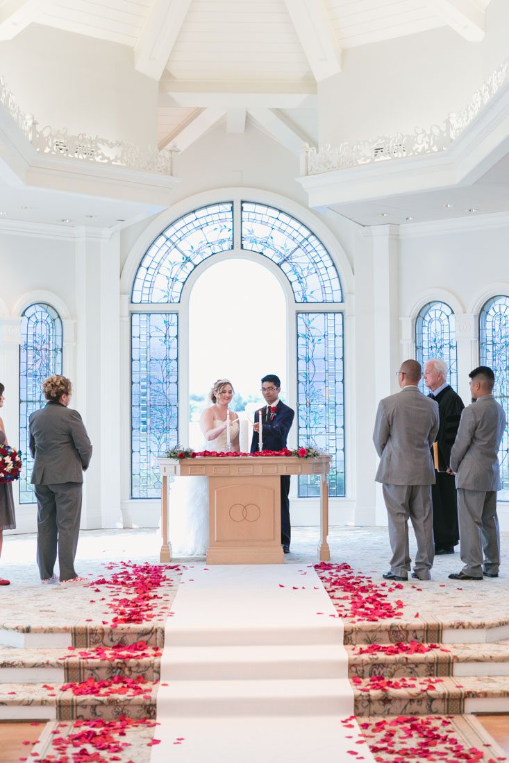 Orlando wedding photographer captures Beauty and the Beast themed Disney wedding at the pavilion and grand floridian