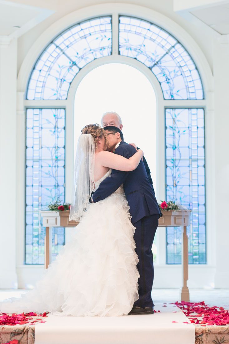 Orlando wedding photographer captures Beauty and the Beast themed Disney wedding at the pavilion and grand floridian