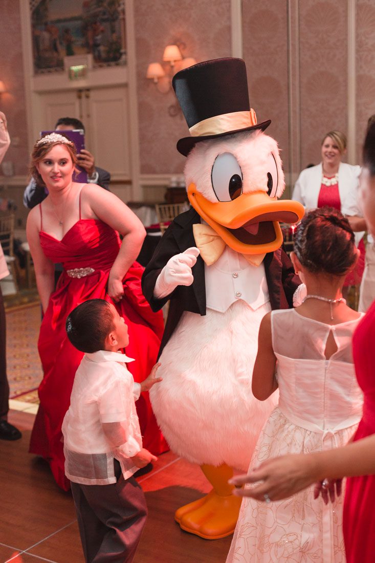 Top Orlando wedding photographer and videographer capture fun wedding at Disney's wedding pavilion at the grand floridan in Orlando