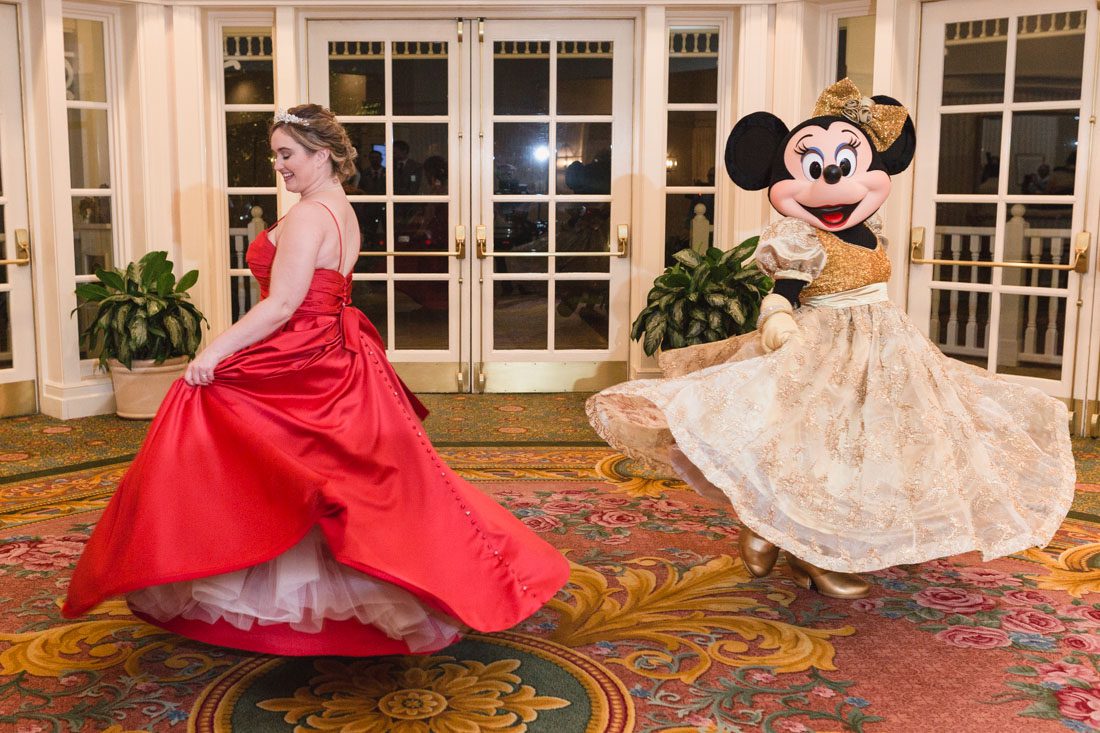 Top Orlando wedding photographer and videographer capture fun themed wedding at Disney's wedding pavilion at the grand floridan in Orlando
