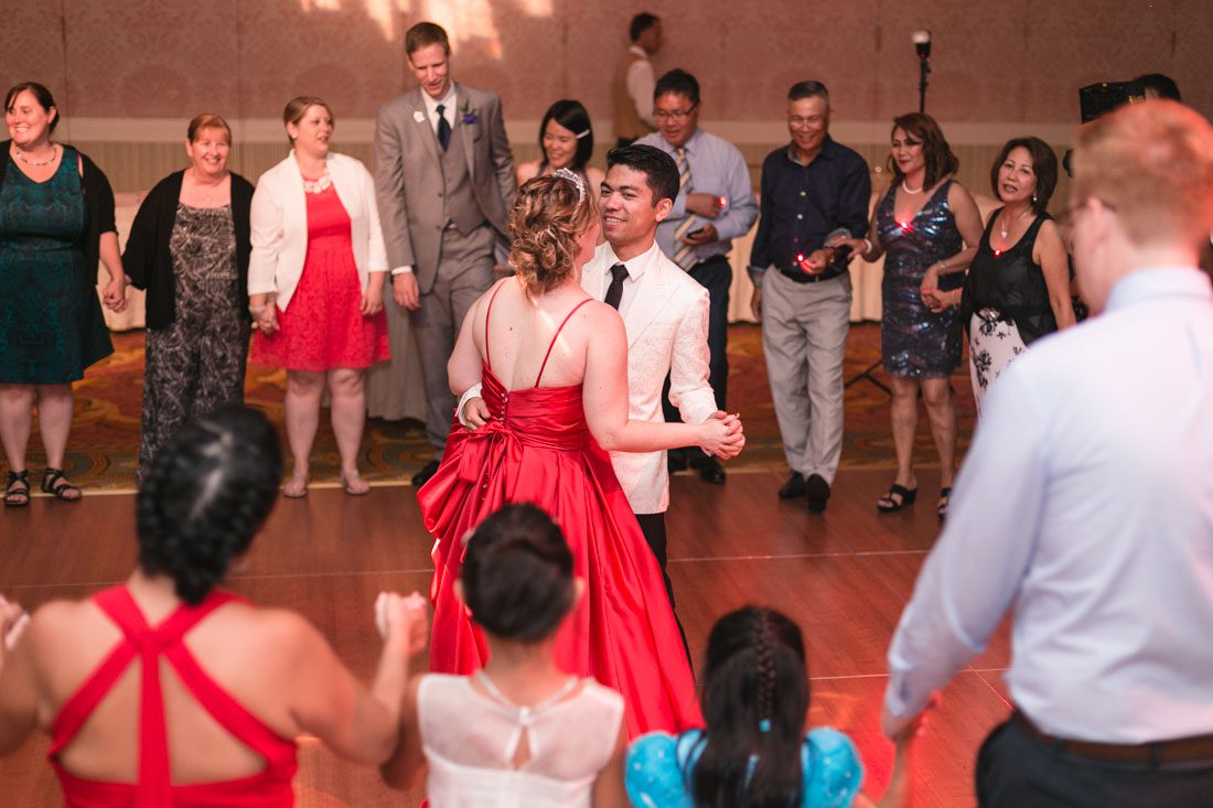 Top Orlando wedding photographer and videographer capture fun themed wedding at Disney's wedding pavilion at the grand floridan in Orlando