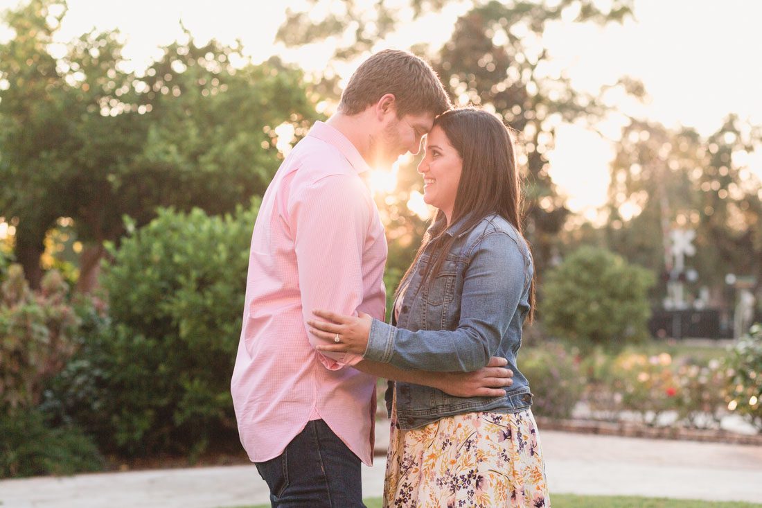Proposal photographer from Orlando captures romantic surprise proposal in Winter Park rose garden