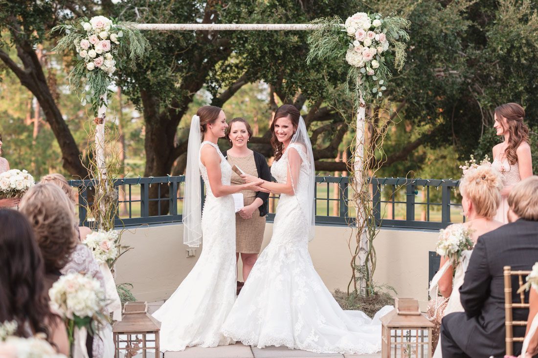 Romantic same-sex wedding at TImacuan golf club in Lake Mary north of Orlando captured by top wedding photographer and videographer