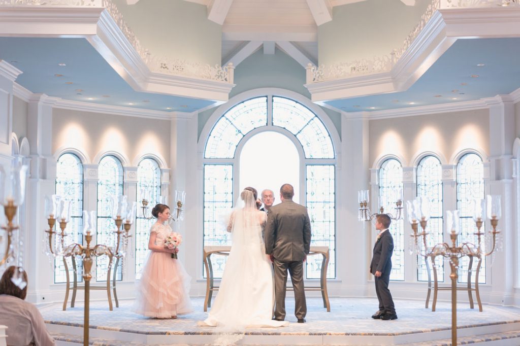 Wedding ceremony at Disney wedding pavilion in Orlando by top photographer