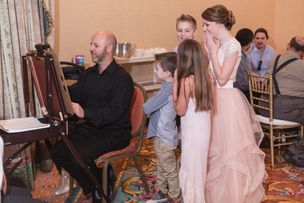 Disney wedding at the grand floridian featuring a caricature artist