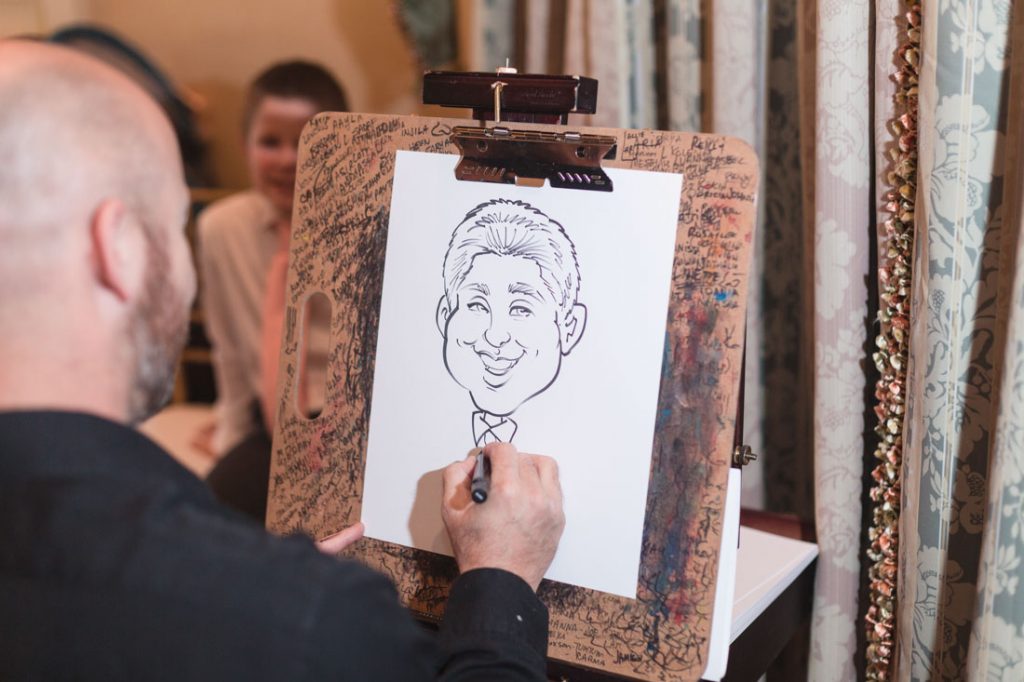 Disney wedding at the grand floridian featuring a caricature artist