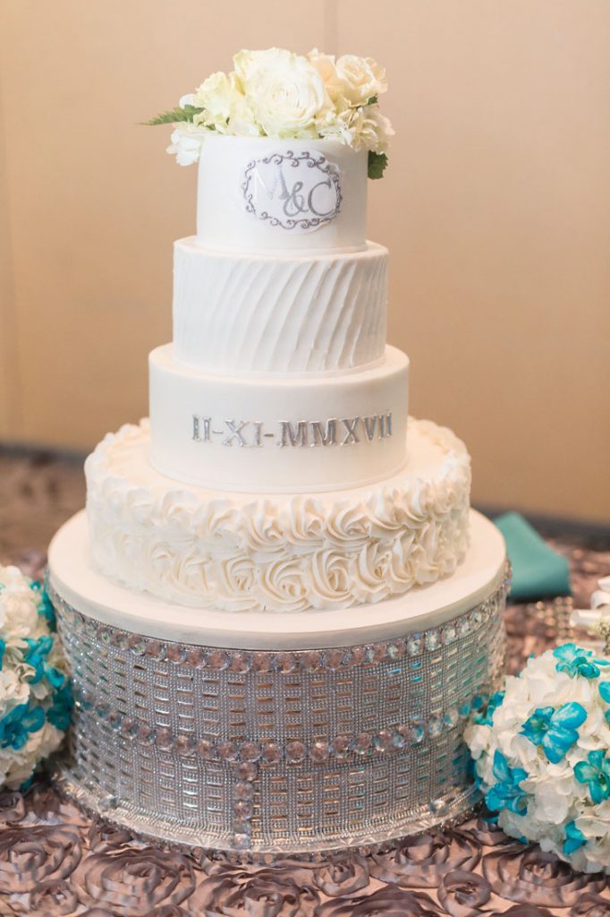 White wedding cake with monogram by Party Flavors in Orlando, Florida