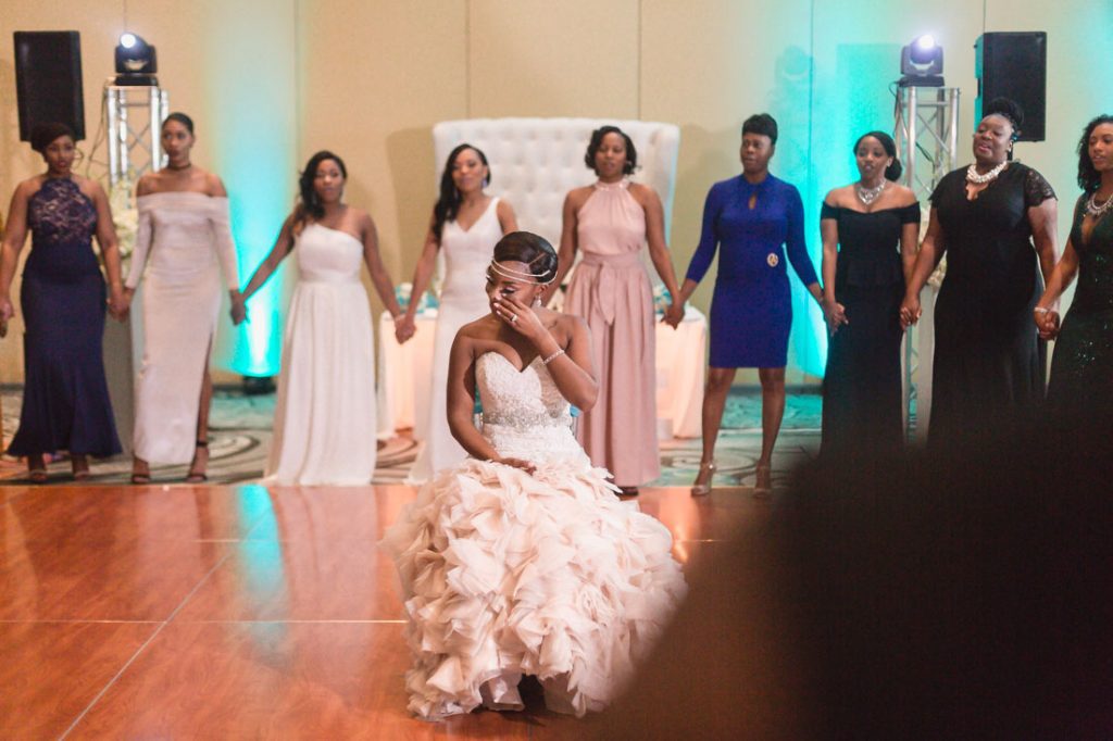 Bride is serenaded by her sorority sister at Gaylord Palms wedding in Orlando