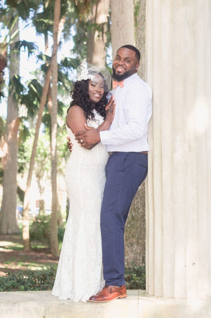 Sweet and intimate wedding ceremony at the monument at Kraft Azalea gardens in Winter Park captured by Orlando photographer