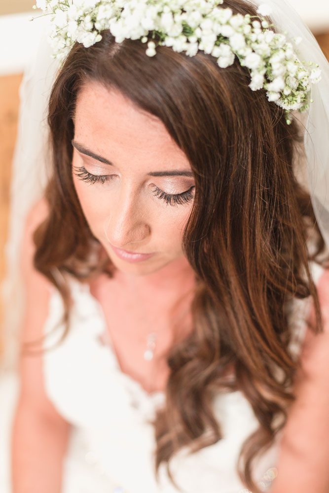 Close up of brides beautiful hair and makeup for her Paradise Cove wedding in Orlando, Florida