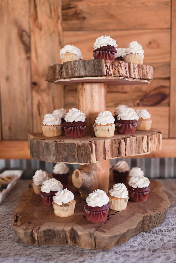 Rustic wooden cupcake stand for a country wedding at a barn in Sumterville, Florida