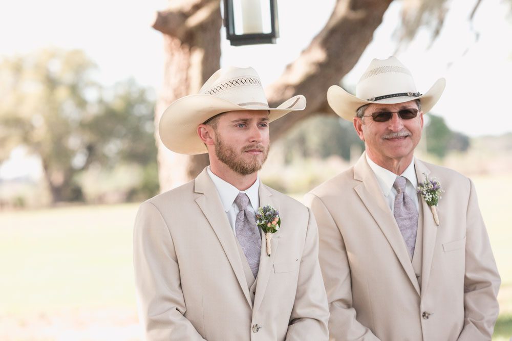 Groom's emotional reaction to seeing his bride for the first time at their rustic country inspired Southern wedding in Florida
