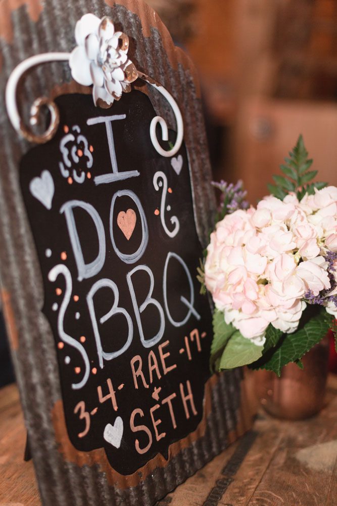 Cute custom decor details for a DIY barn wedding in Sumterville, north of Orlando captured by top wedding photographer