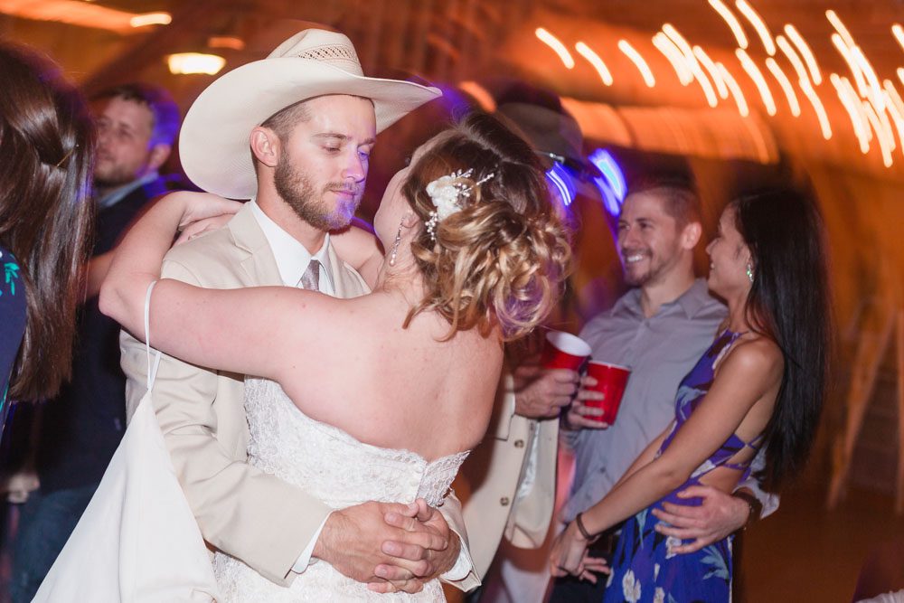 Photos of a fun country wedding reception at a barn north of Orlando Florida