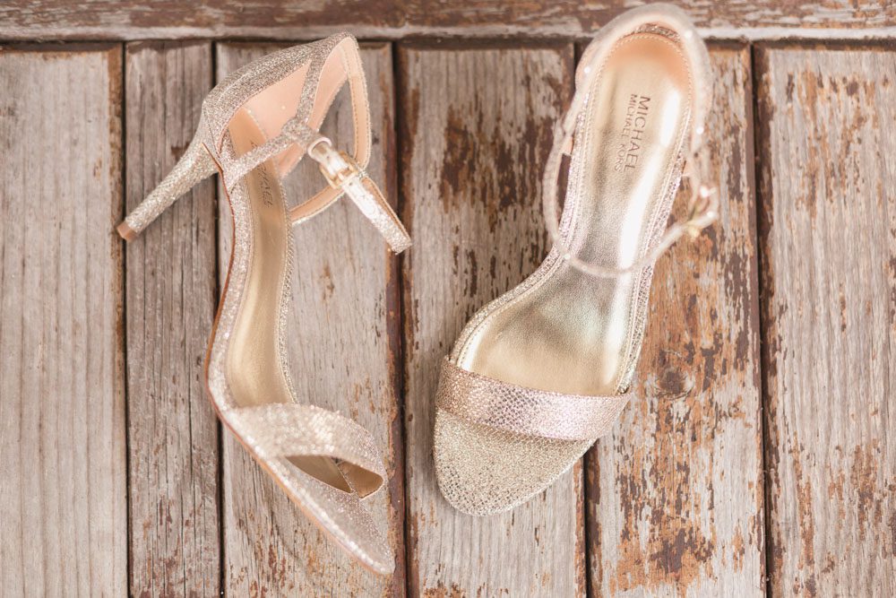 Sparkly gold shoes captured by top Orlando wedding photographer for rustic chic boho wedding in Kissimmee Florida