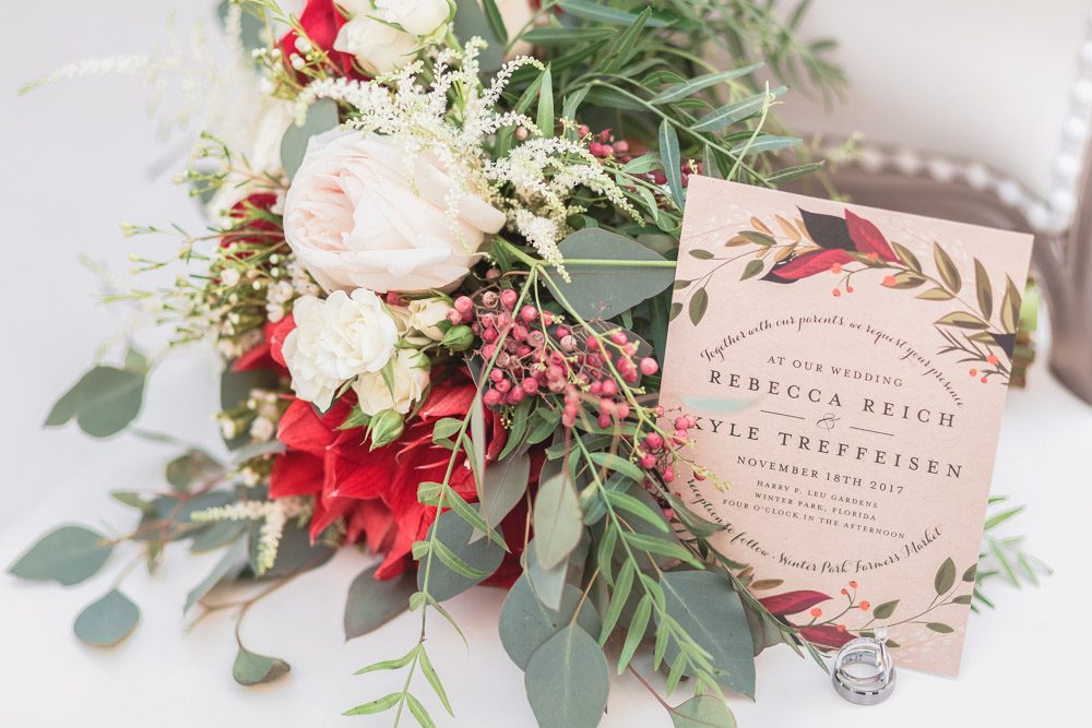 Wedding bouquet and invitation details captured by top Orlando wedding photographer and videographer