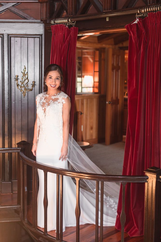 Bride on the balcony of the Estate on the Halifax venue in Port Orange east of Orlando