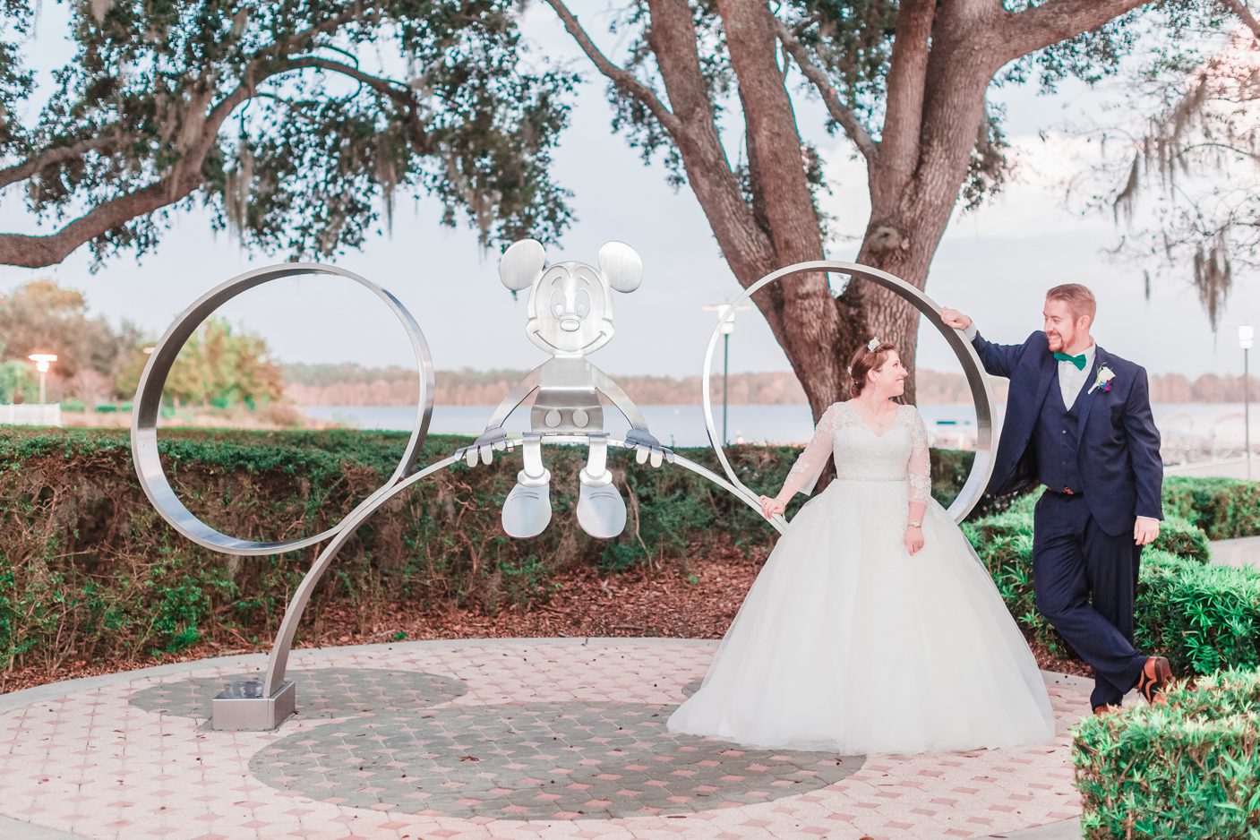 Disney wedding photography at Mickey sculpture at the Contemporary hotel in orlando