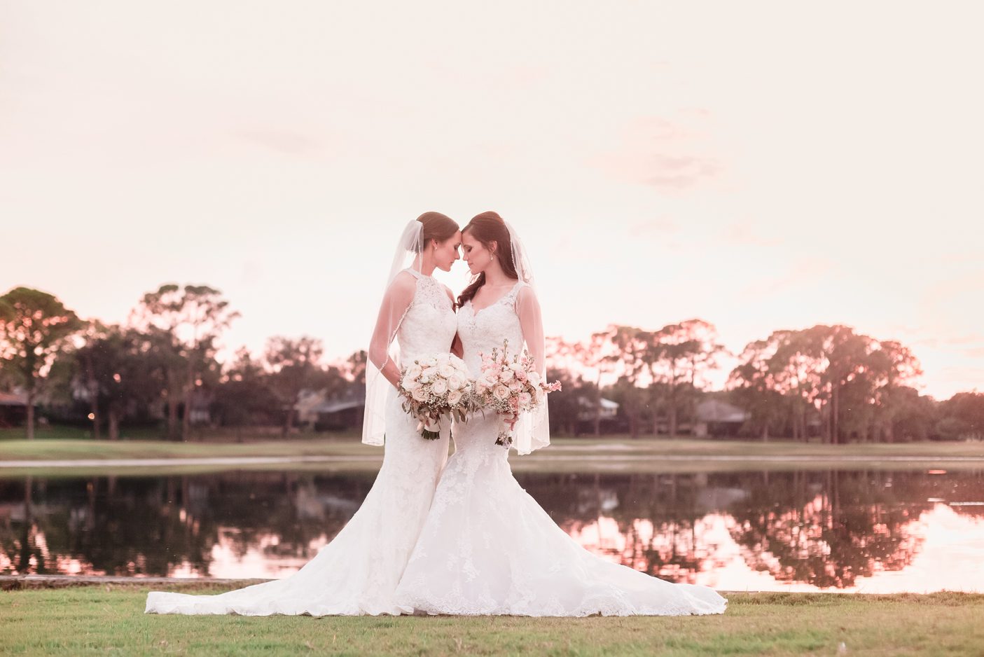 Photo of Two brides on their gay wedding day at sunset in Orlando florida