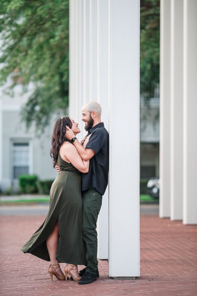 Creative engagement photo with architecture at an engagement session in Orlando Florida