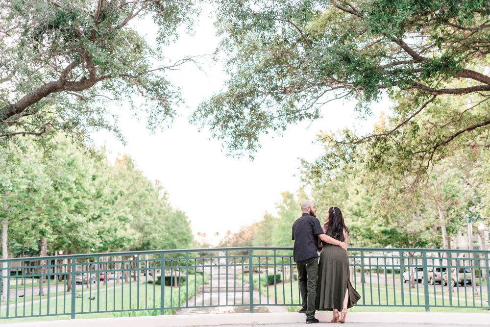 Romantic engagement photo on a bridge in Celebration Florida captured by top Orlando photographer