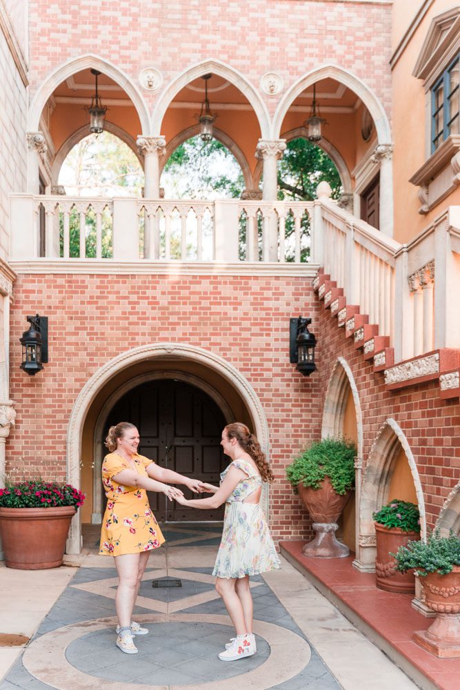 Fun and playful engagement session in Italy at Epcot in Disney captured by top Orlando gay wedding and engagement photographer