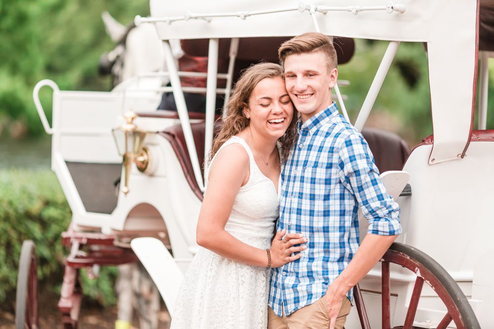 Orlando Engagement photography session at Disney Port Orleans Riverside with a horse and carriage