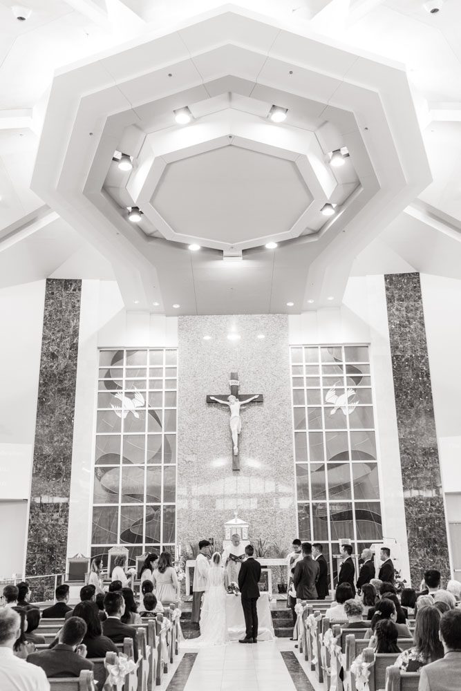 Catholic Vietnamese wedding ceremony in Oklahoma City captured by traveling wedding photographers from Orlando