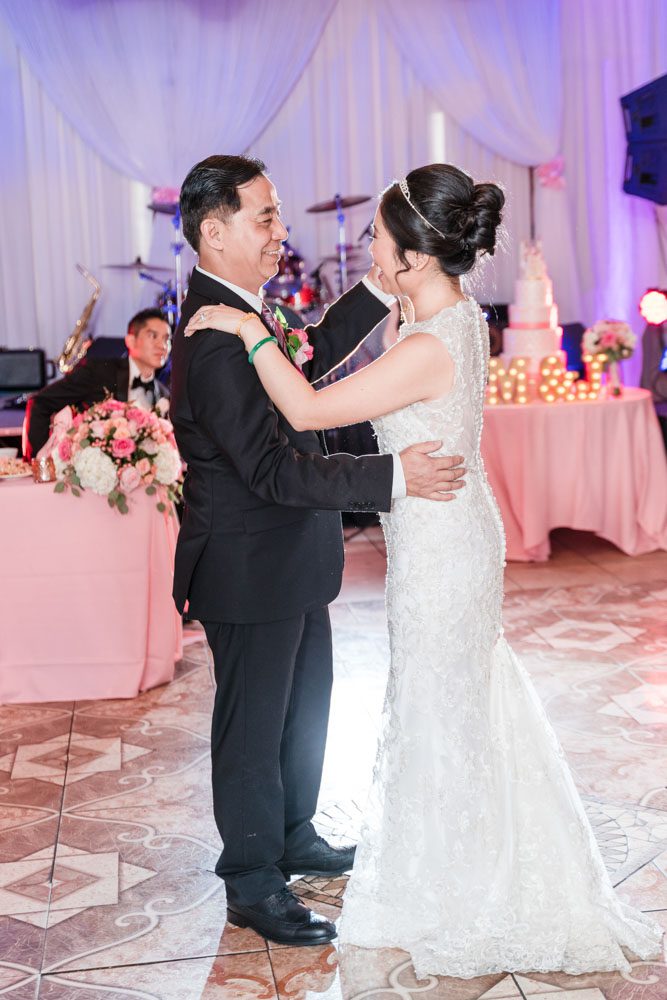 Top Orlando wedding photographers captures the bride dancing with her dad at Hy Palace in Oklahoma