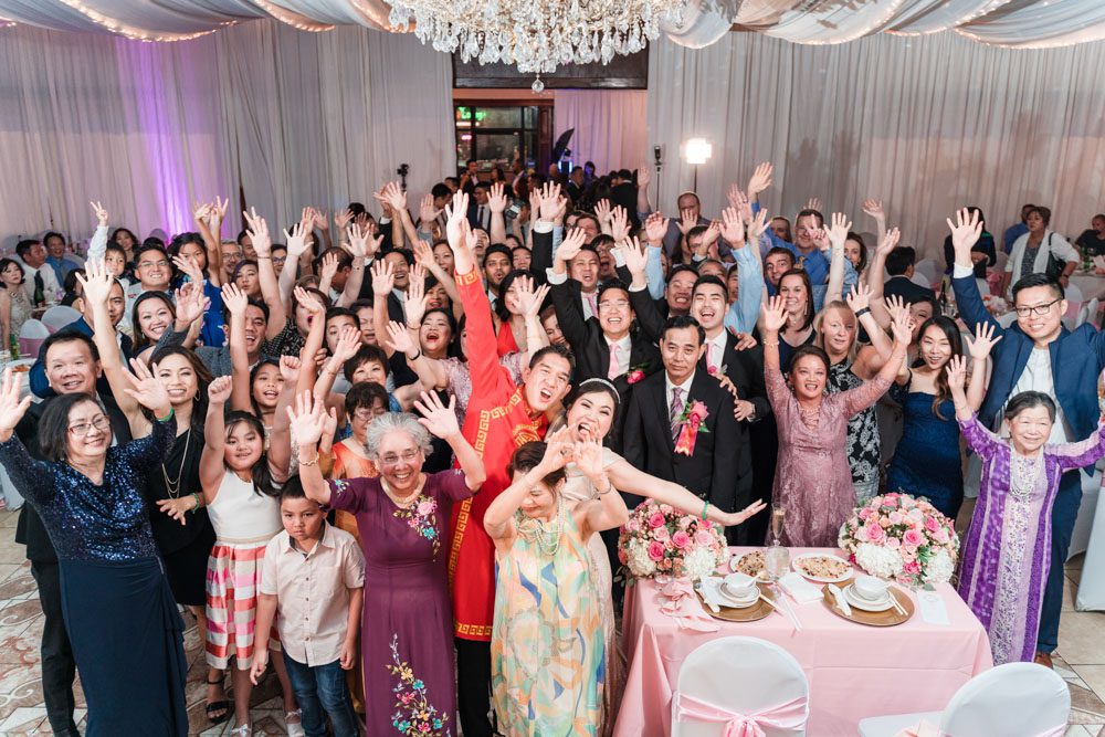 Group photo of all guests at the reception at Hy Palace in Oklahoma City