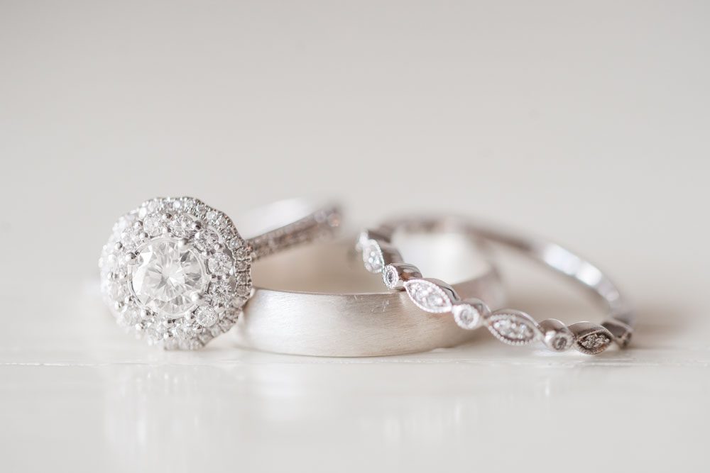 Close up photo of the wedding rings captured by top Orlando wedding photographer and videographer