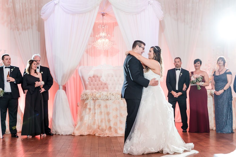 Bride and groom at their wedding reception at the Crystal Ballroom captured by Orlando wedding photographer and videographer