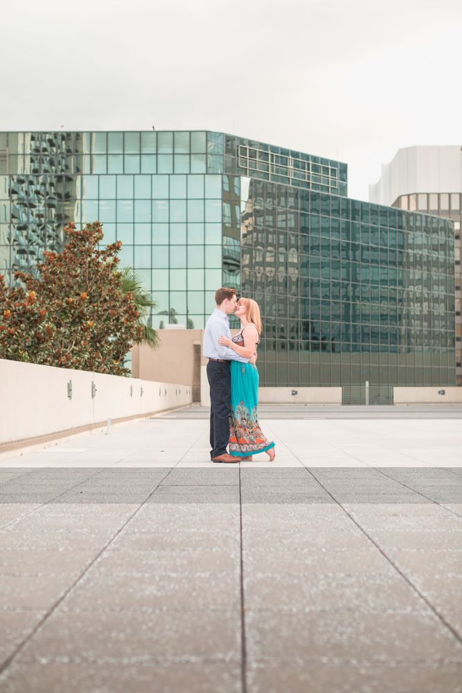 Orlando proposal photographer captures a romantic rooftop engagement session featuring the downtown skyline view from The Balcony rooftop venue