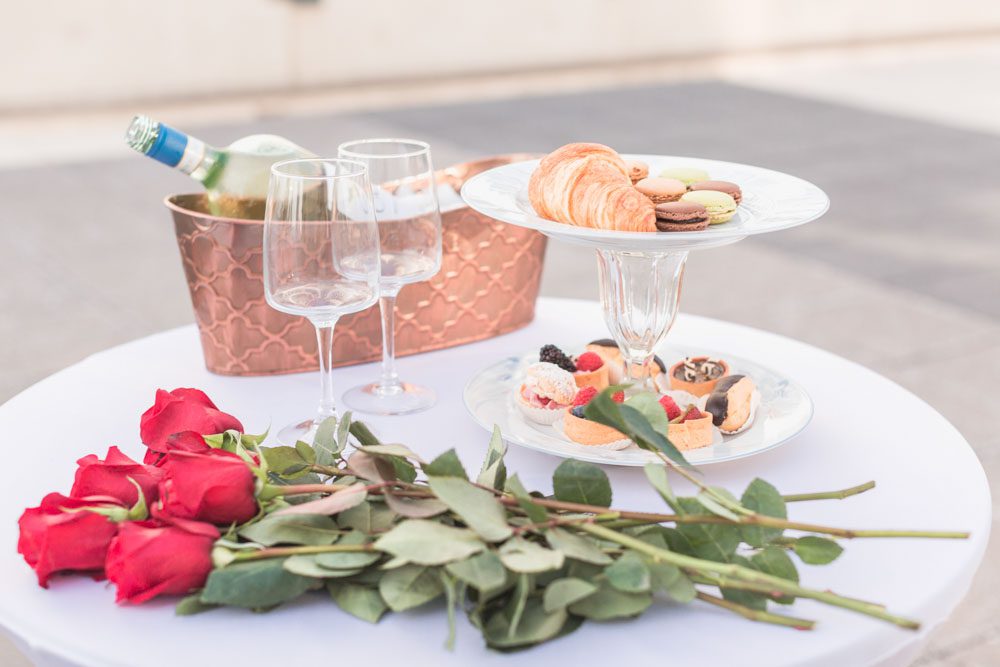 Romantic surprise proposal in Orlando at The Balcony captured by top engagement photographer