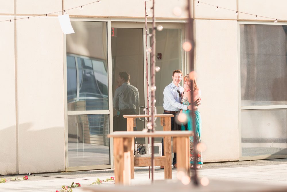 Orlando surprise proposal on a rooftop at The Balcony venue captured by top engagement photographer
