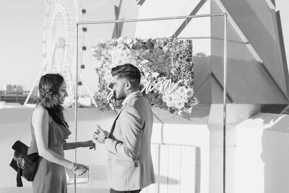 Surprise proposal in Orlando at The Castle Hotel rooftop captured by top Orlando engagement photographer