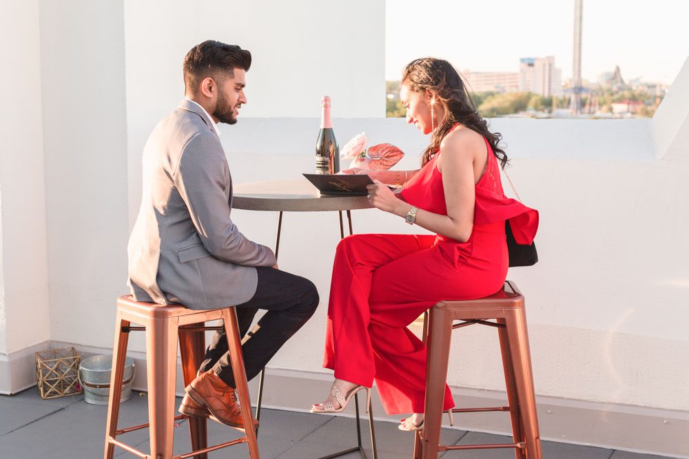 Romantic sunset surprise proposal on a rooftop in Orlando, Florida