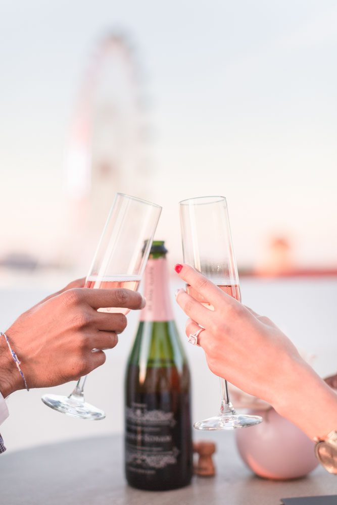Surprise proposal in Orlando at The Castle Hotel rooftop captured by top Orlando engagement photographer