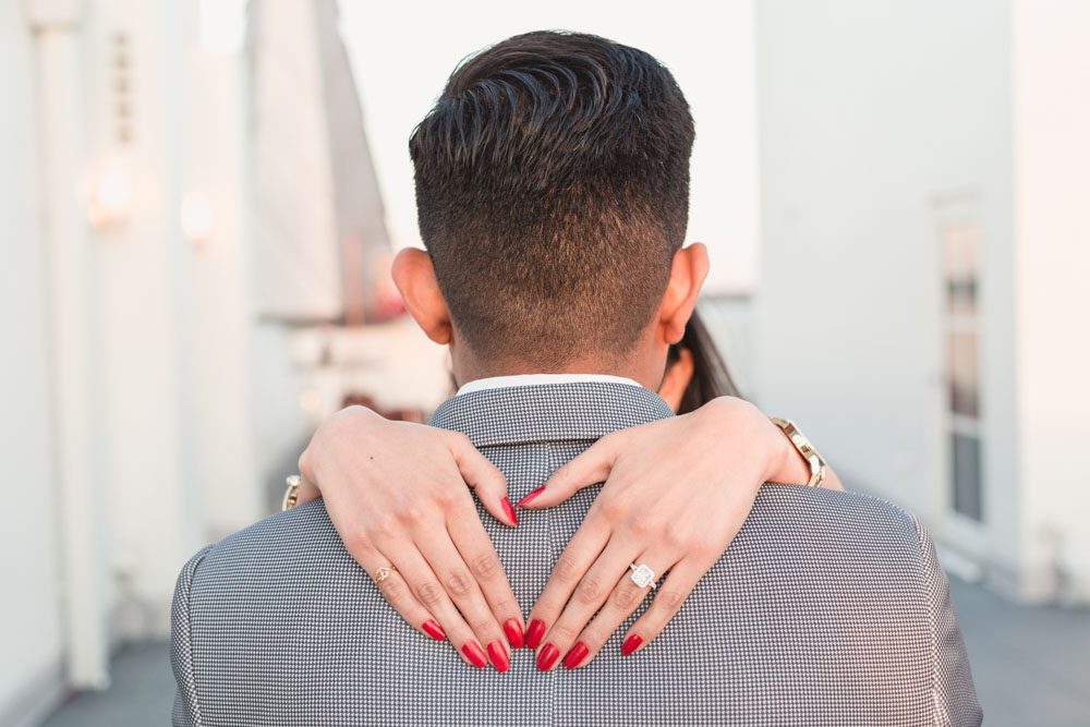 Surprise proposal in Orlando at The Castle Hotel rooftop captured by top Orlando engagement photographer