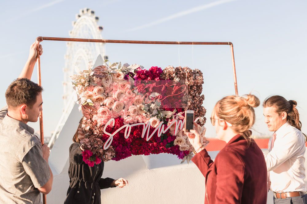 Custom sign and decorations made for a surprise proposal near ICON Orlando ferris wheel
