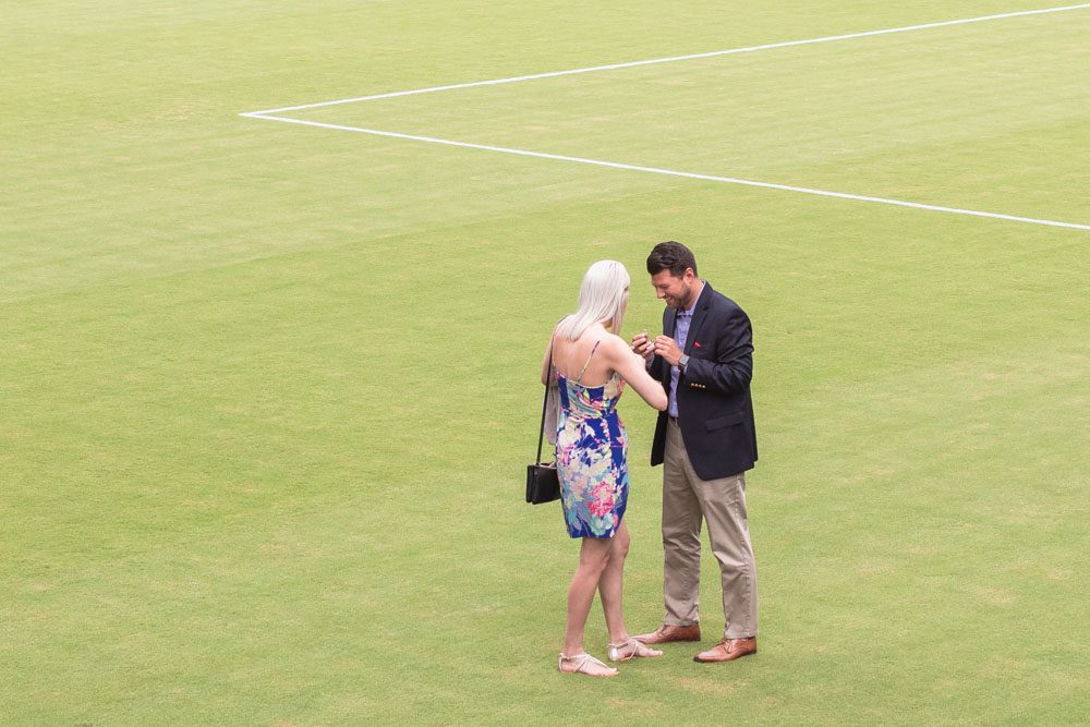 Orlando engagement photographer captures a surprise proposal on the field at the Orlando City Soccer Exploria stadium in downtown
